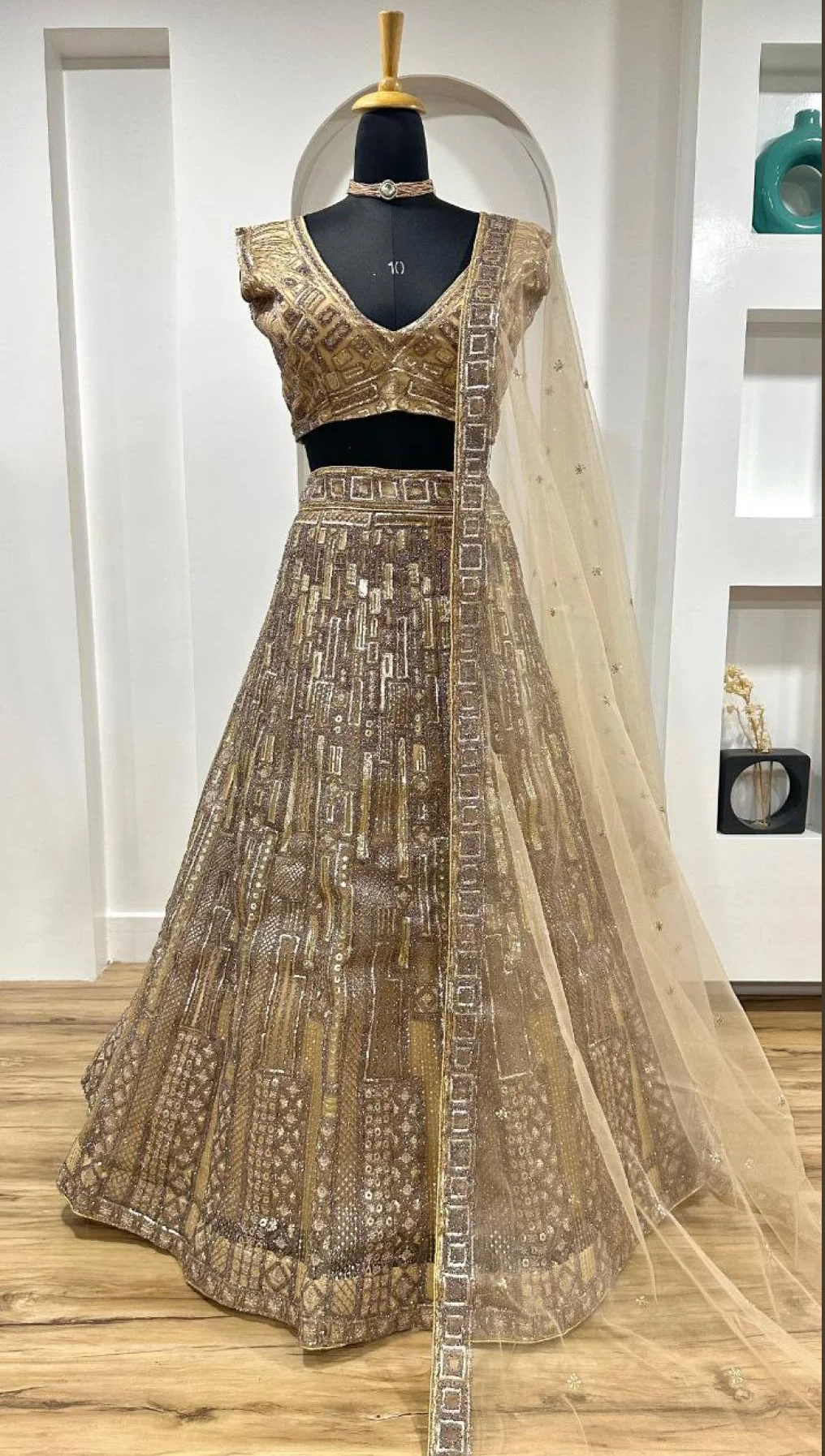 Golden Elegance – Embroidered Net Lehenga Choli with Dupatta