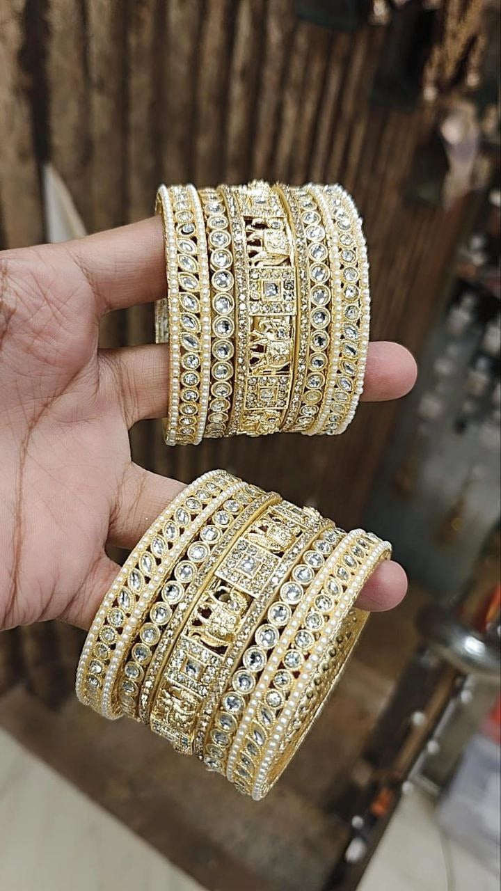 Exquisite Gold Bangles Adorned with Diamonds