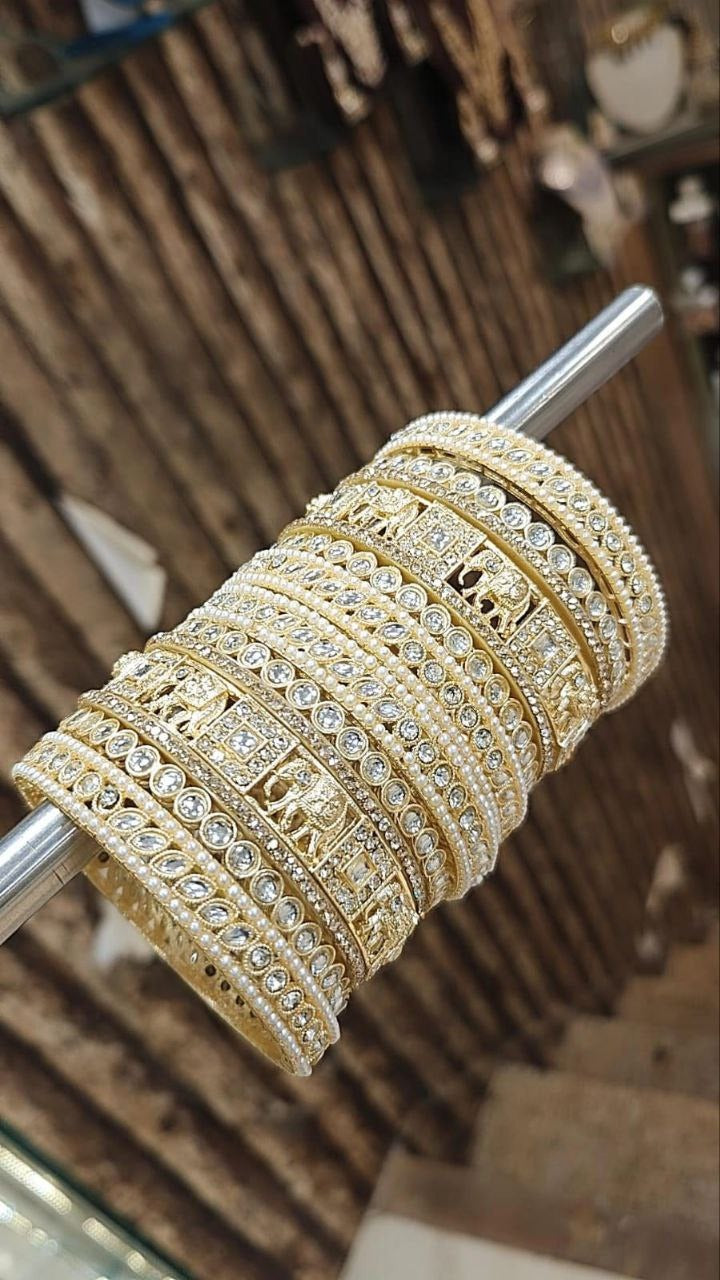Exquisite Gold Bangles Adorned with Diamonds
