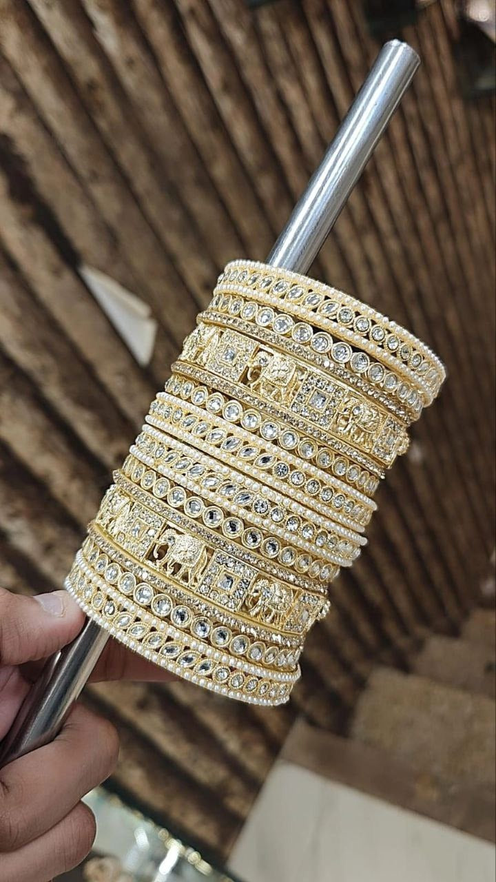 Exquisite Gold Bangles Adorned with Diamonds