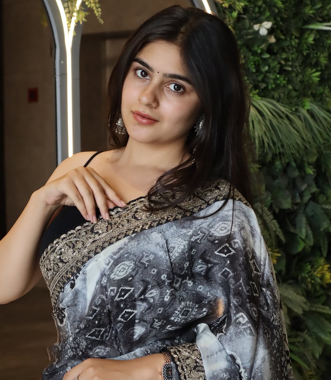 Elegant Black and White Saree with Intricate Lace Border