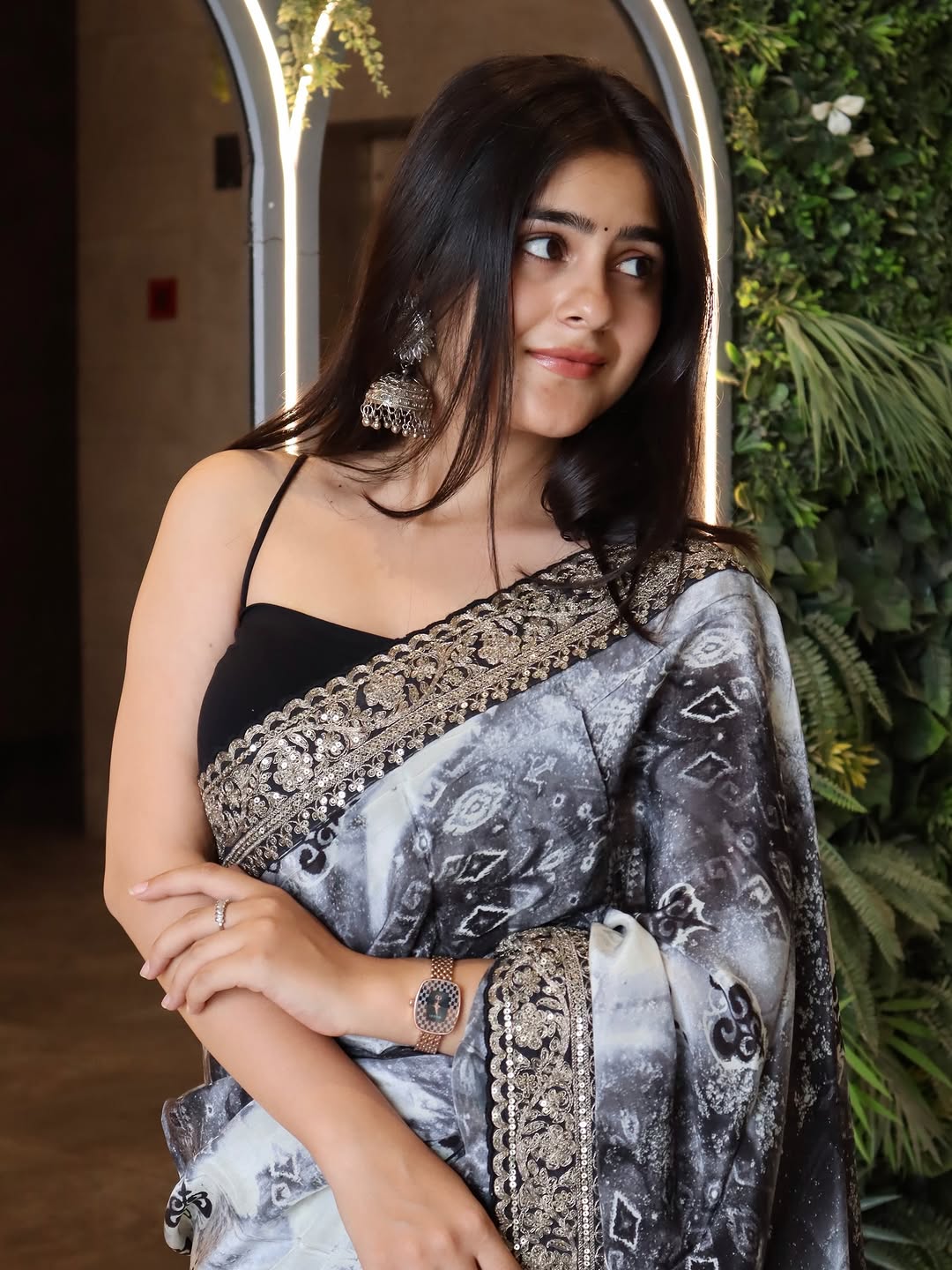 Elegant Black and White Saree with Intricate Lace Border