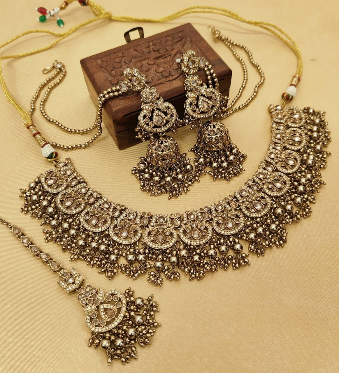 Exquisite Monalisa & Reverse AD Stone Work Jhumka & Tikka Set – Gold Plated Elegance in Stunning Colors