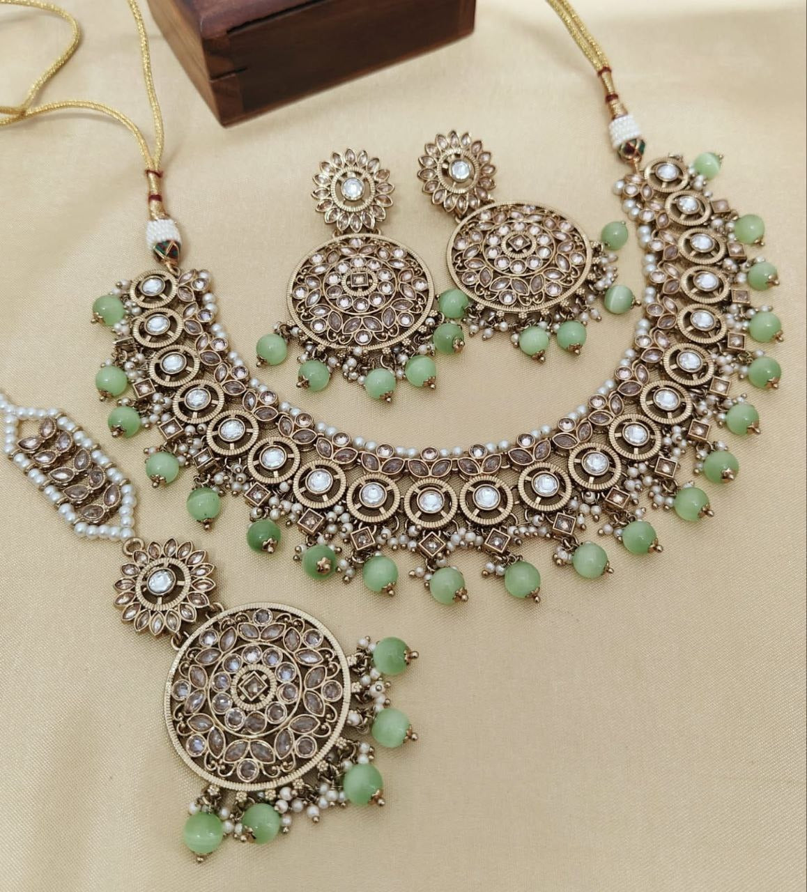 Elegant Reverse AD Stonework Necklace Set with Earrings & Tikka