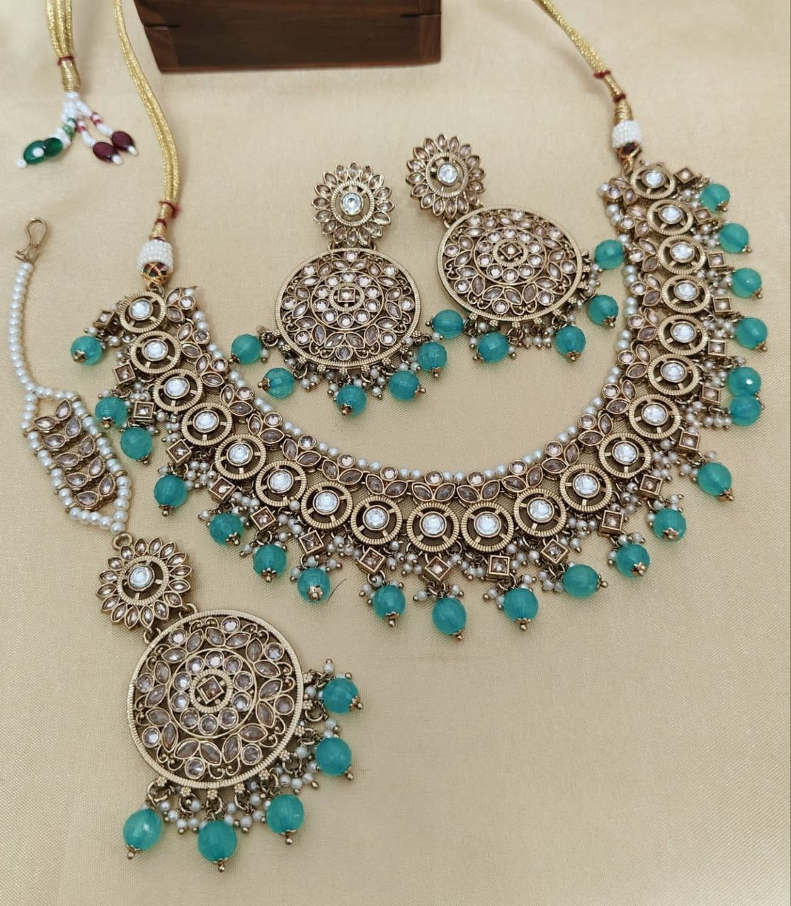 Elegant Reverse AD Stonework Necklace Set with Earrings & Tikka