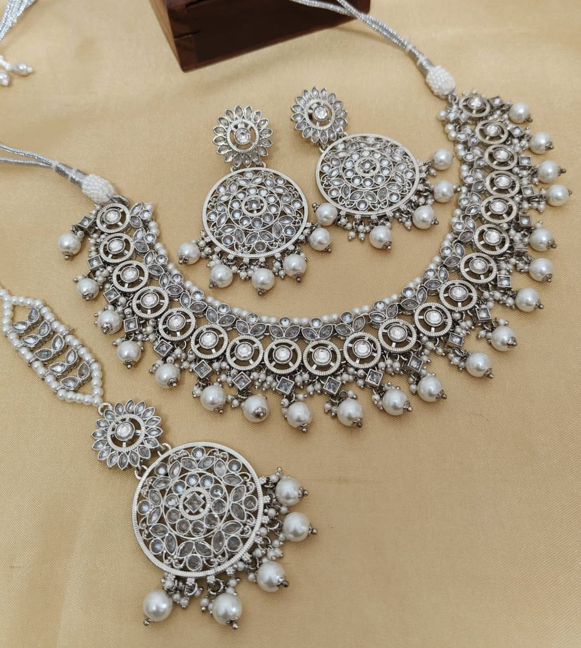 Elegant Reverse AD Stonework Necklace Set with Earrings & Tikka