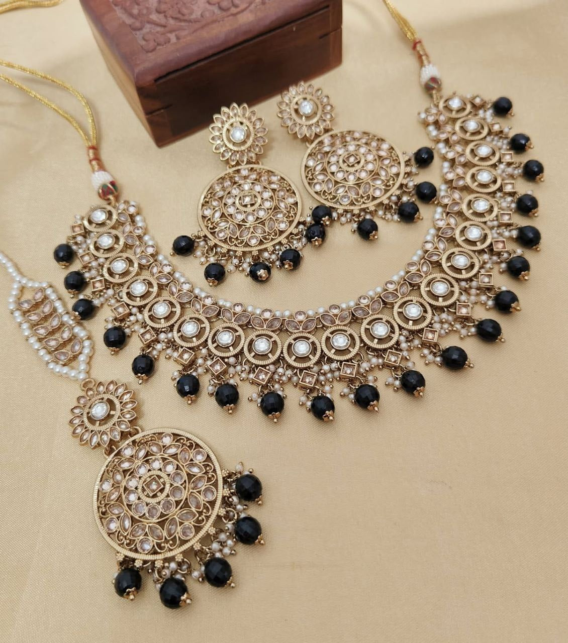 Elegant Reverse AD Stonework Necklace Set with Earrings & Tikka