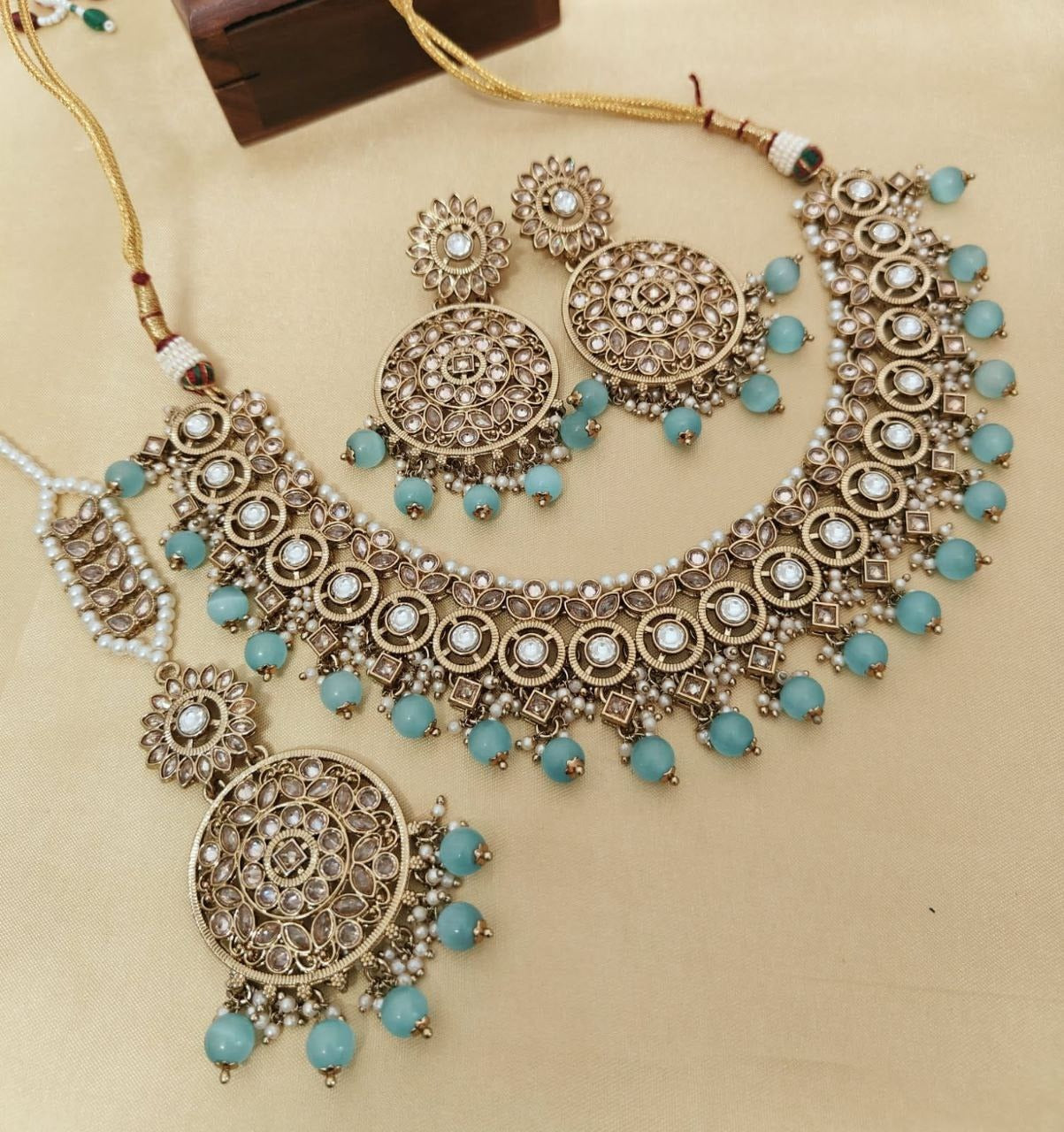 Elegant Reverse AD Stonework Necklace Set with Earrings & Tikka