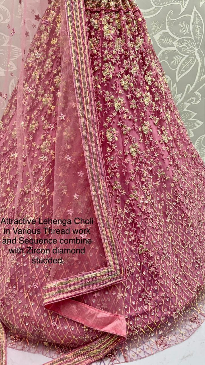 Glamorous Heavy Net Lehenga Choli with Multi-Thread, Sequins & Zircon Studded Detailing
