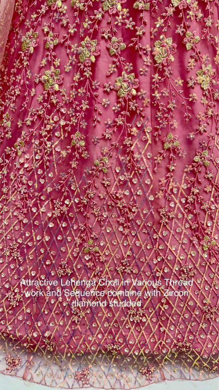 Glamorous Heavy Net Lehenga Choli with Multi-Thread, Sequins & Zircon Studded Detailing