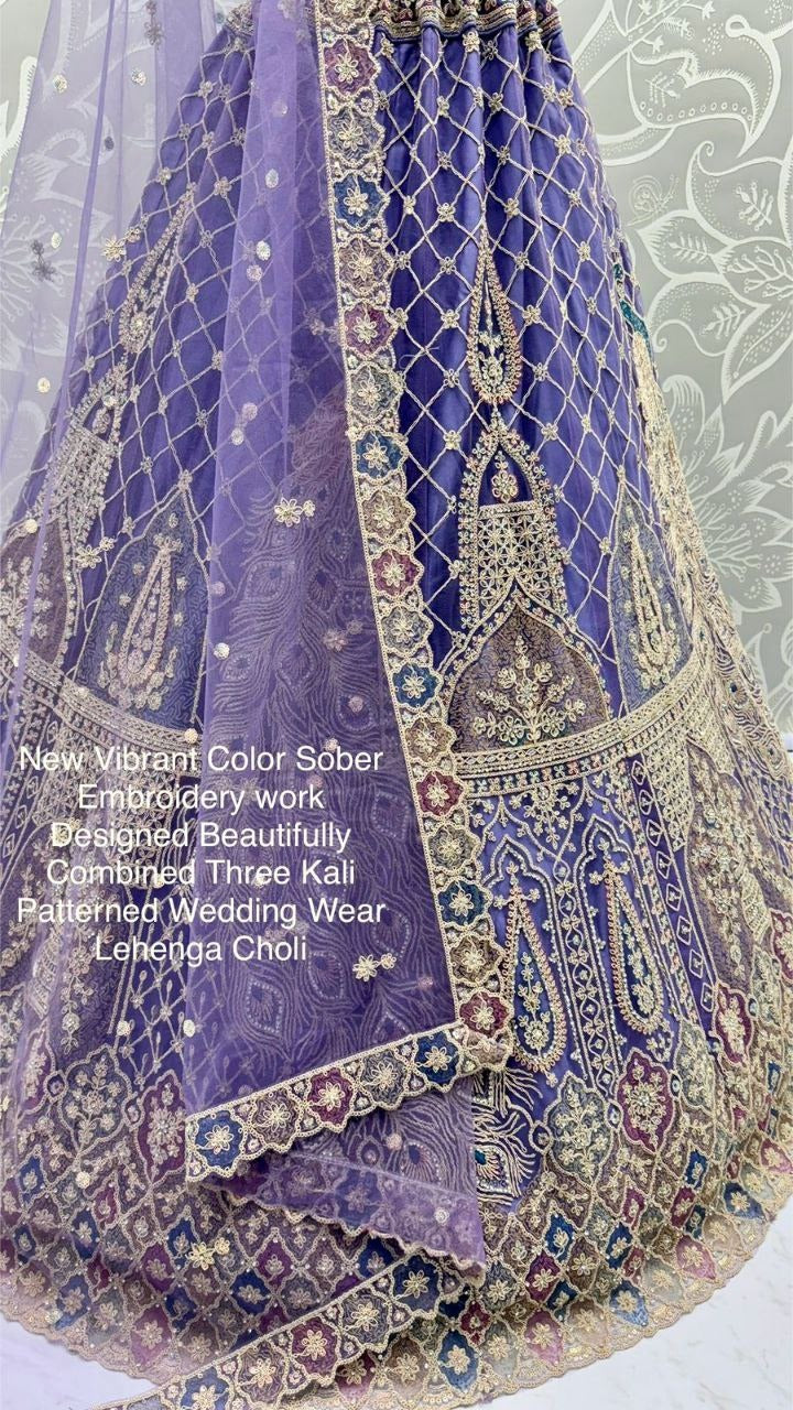 New Vibrant Wedding Wear Net Lehenga Choli with Peacock Embroidery, Zari & Diamond Work – Three Kali Pattern | Elegant Reception Ensemble