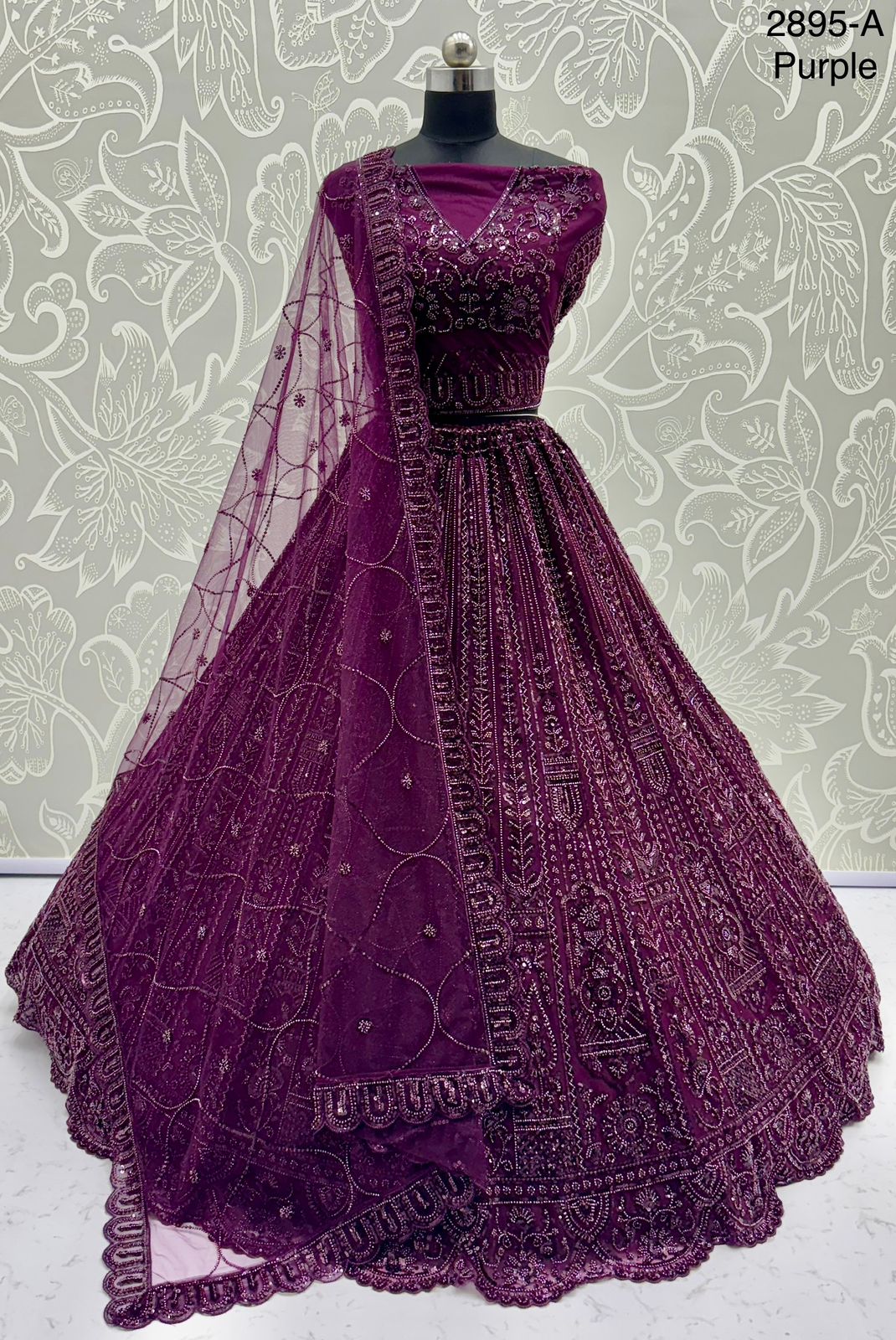 Exquisite Handwork Net Lehenga Choli – Motif, Sequin & Thread Embroidery