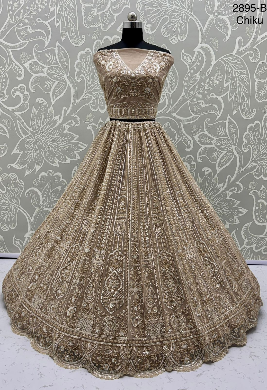 Exquisite Handwork Net Lehenga Choli – Motif, Sequin & Thread Embroidery