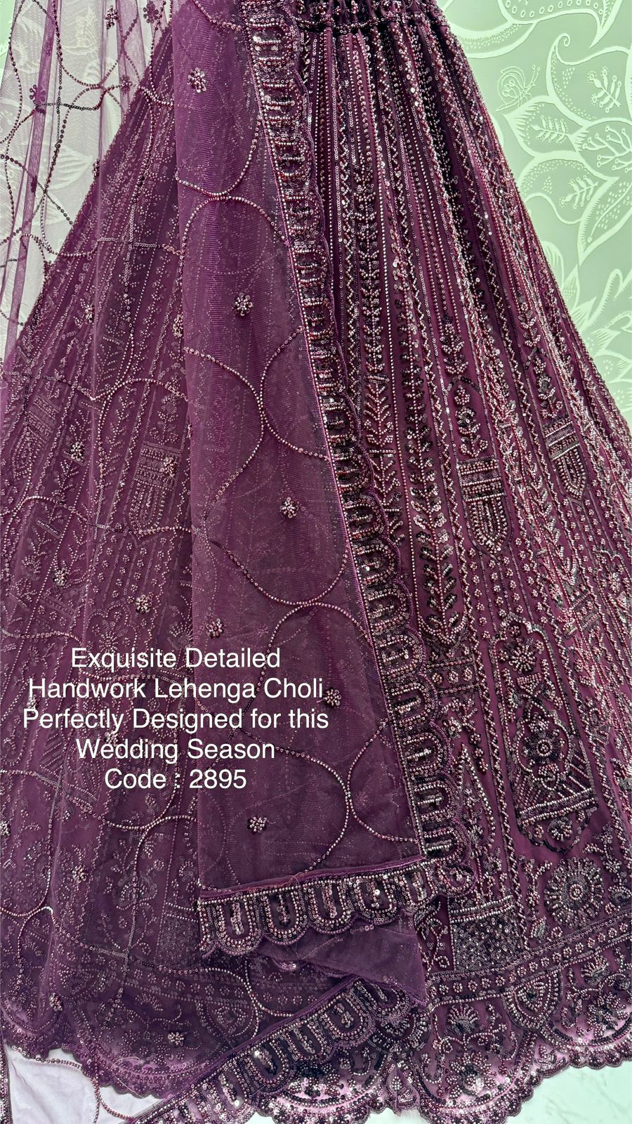 Exquisite Handwork Net Lehenga Choli – Motif, Sequin & Thread Embroidery
