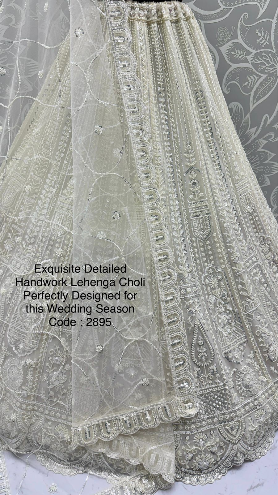 Exquisite Handwork Net Lehenga Choli – Motif, Sequin & Thread Embroidery