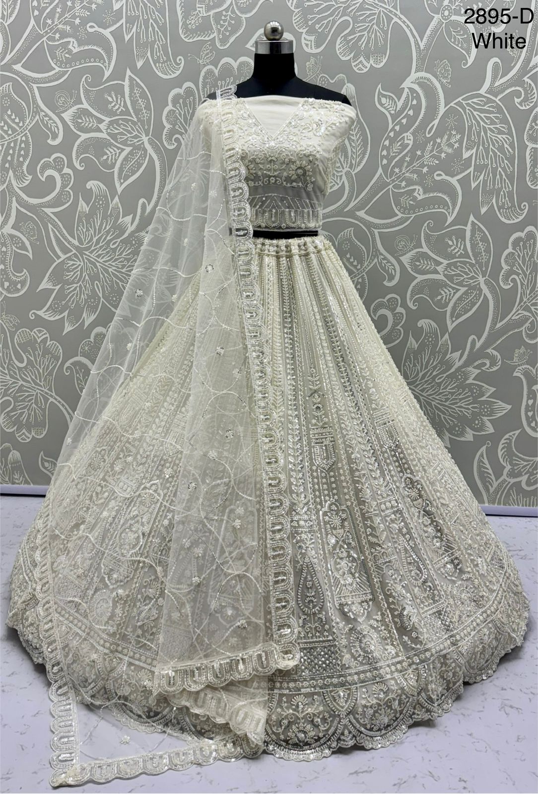 Exquisite Handwork Net Lehenga Choli – Motif, Sequin & Thread Embroidery