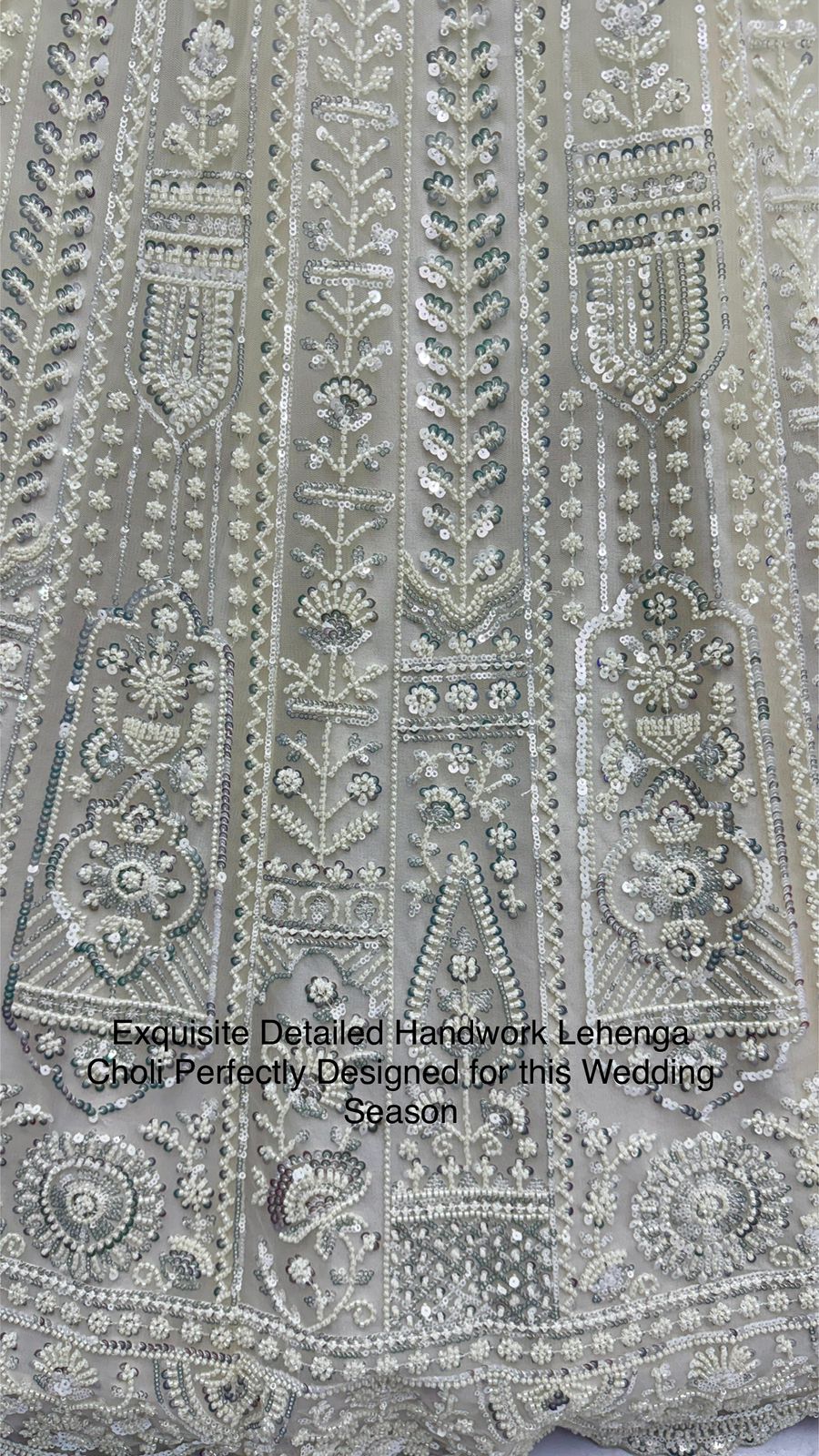 Exquisite Handwork Net Lehenga Choli – Motif, Sequin & Thread Embroidery