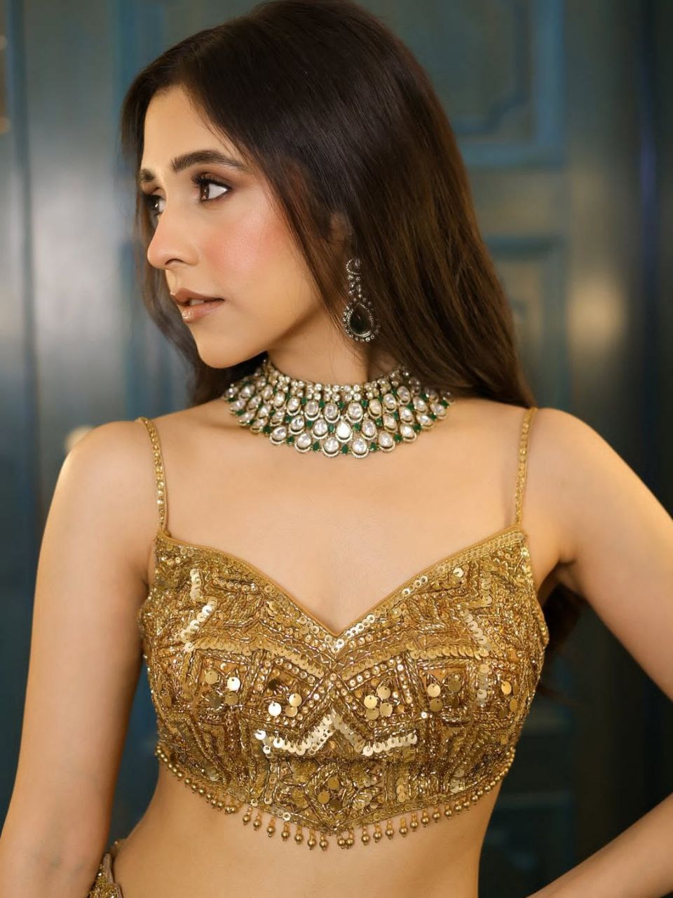 Regal Gold Embroidered Lehenga Set with Handcrafted Detailing & Net Dupatta