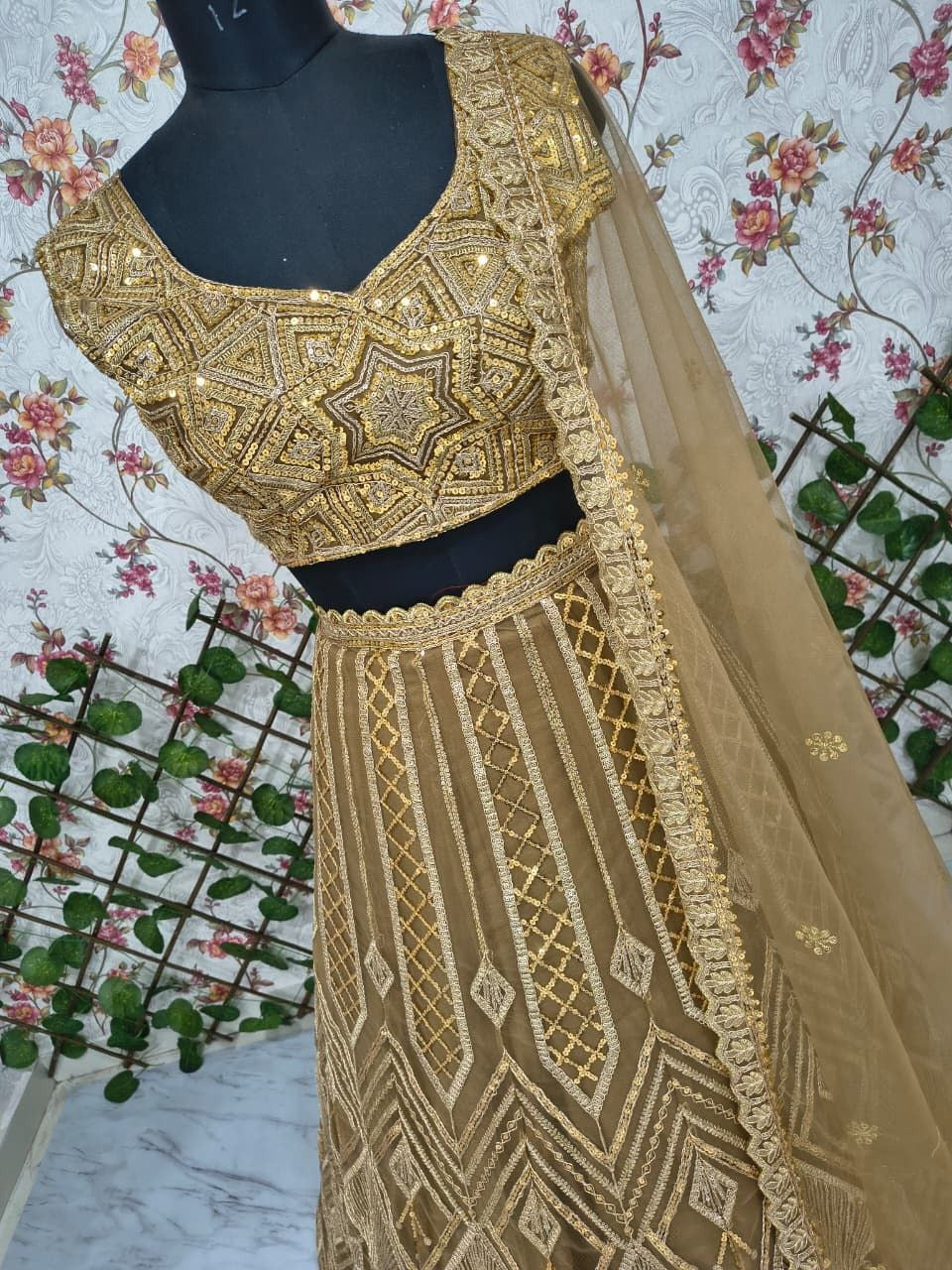 Regal Gold Embroidered Lehenga Set with Handcrafted Detailing & Net Dupatta