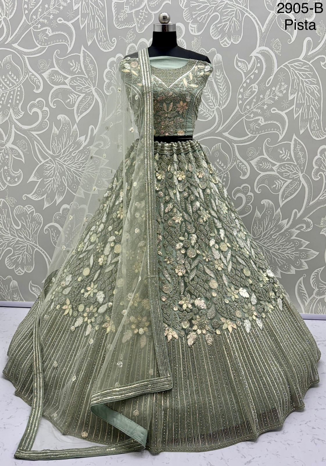 Eye-Catchy Designer Lehenga Choli with Zircon Diamond & Sequins Work – Available in Pista Green, White, Gold & Lilac | Code: 2905