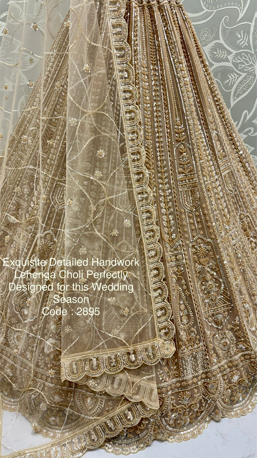 Exquisite Handwork Net Lehenga Choli – Motif, Sequin & Thread Embroidery